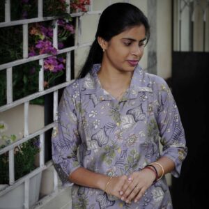 Vibrant Multi Color Floral Raw Silk Three Quarter Sleeve Kurti with Collar Neck